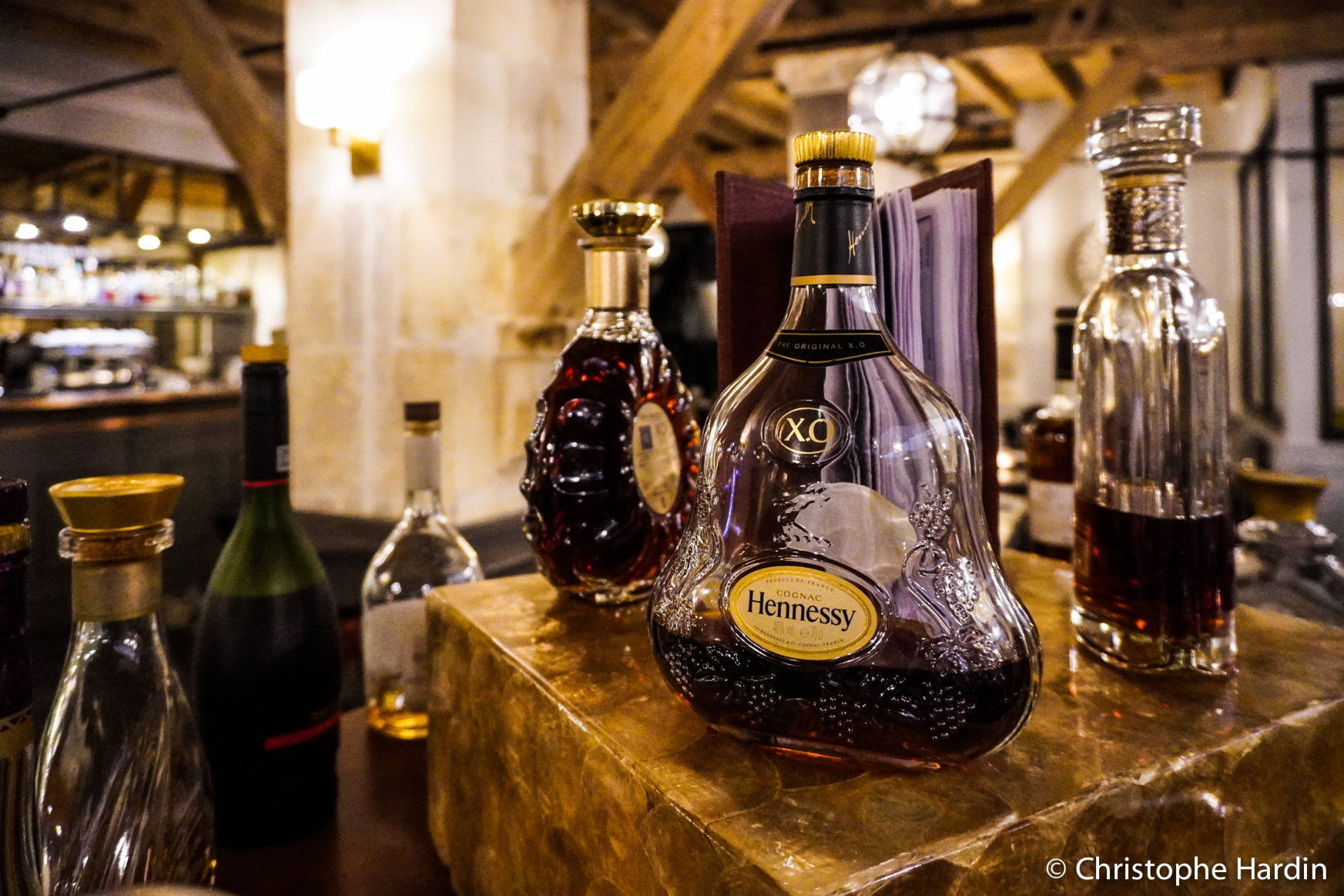 Bottles of cognac, including one by Hennessy, in the bar in Cognac, Charente, France, October 15, 2024. Hotel Chais Monnet & Spa Cognac.<br />Des bouteilles de cognac dont une de la marque Hennessy dans le bar à Cognac, Charente, France, le 15 octobre 2024. Hôtel Chais Monnet & Spa Cognac.