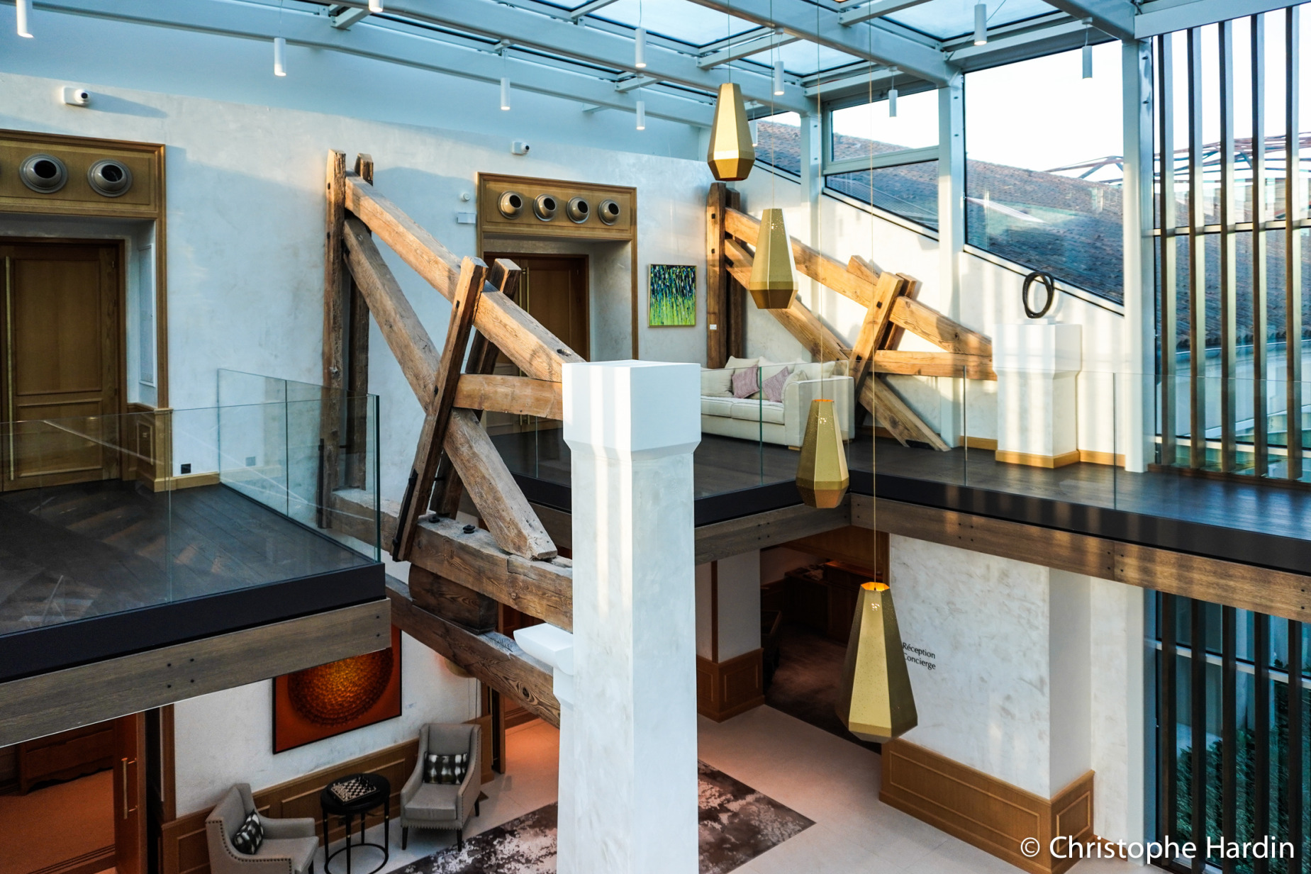 The structure of the Hotel Chais Monnet & Spa blending exposed beams and glass in Cognac, Charente, France, on October 15, 2024.<br />La structure de l'Hôtel Chais Monnet & Spa dans laquelle se mélangent les poutres apparentes et le verre à Cognac, Charente, France, le 15 octobre 2024.